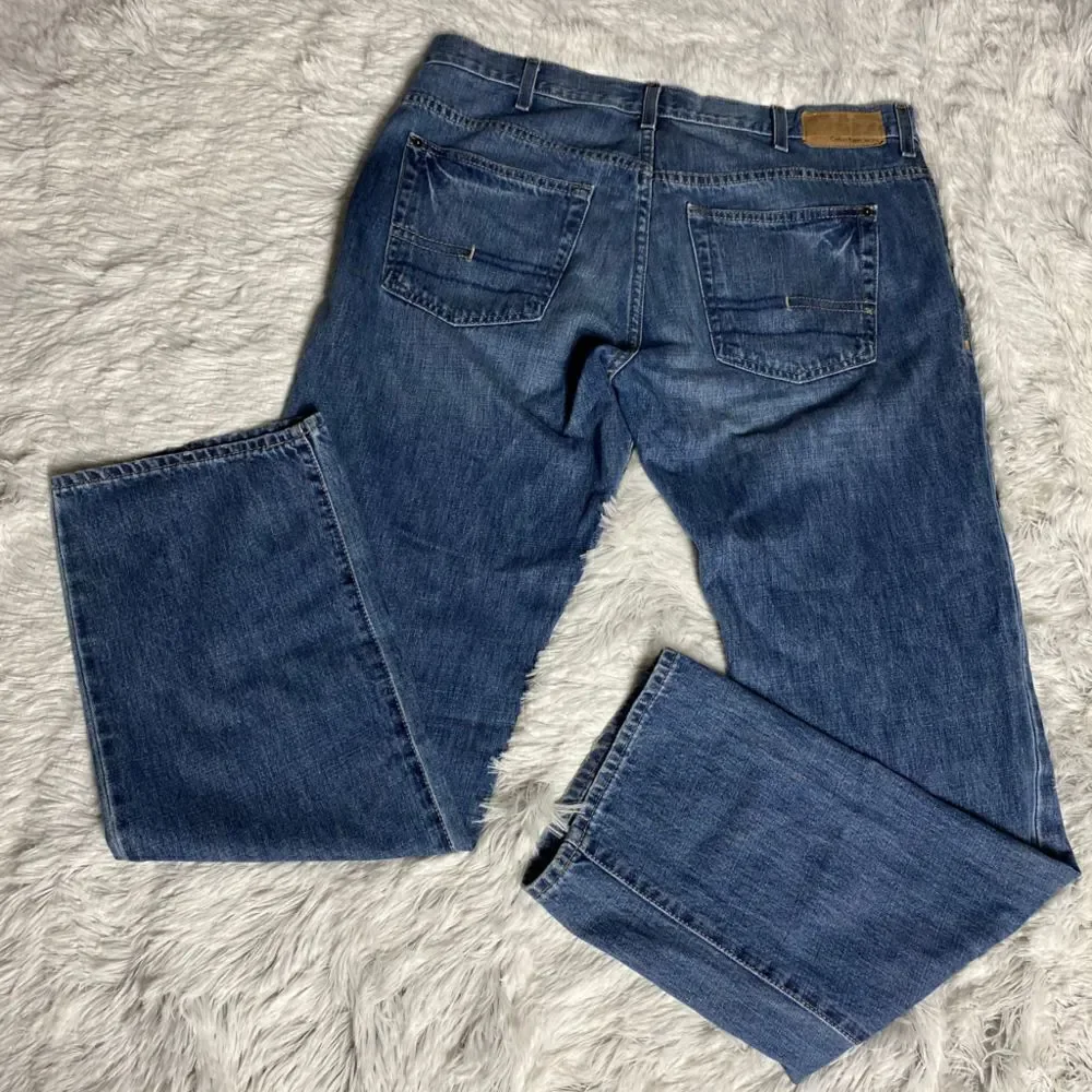 Calvin Klein Straight Cut Distressed Jeans - Picture 2 of 5